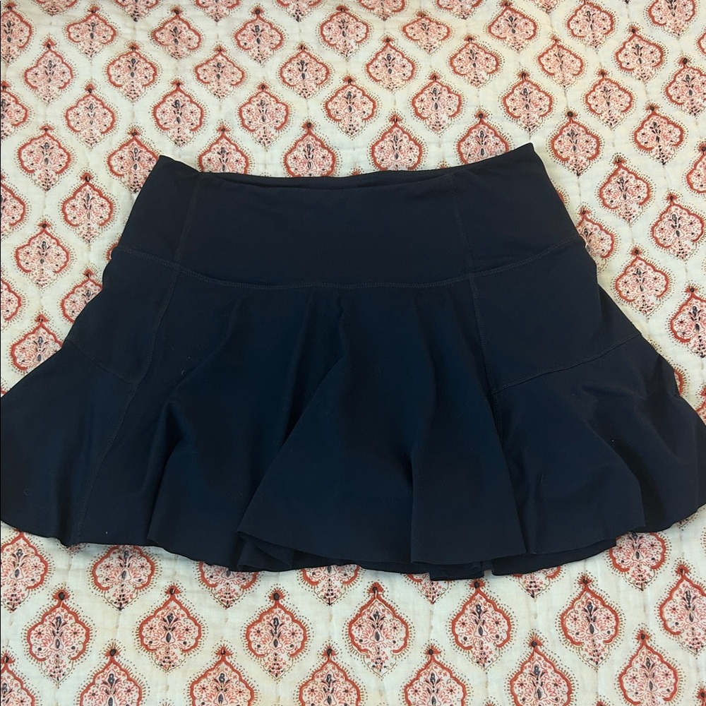 Navy Free People Movement Women's Athletic Skirt. Built in shorts.